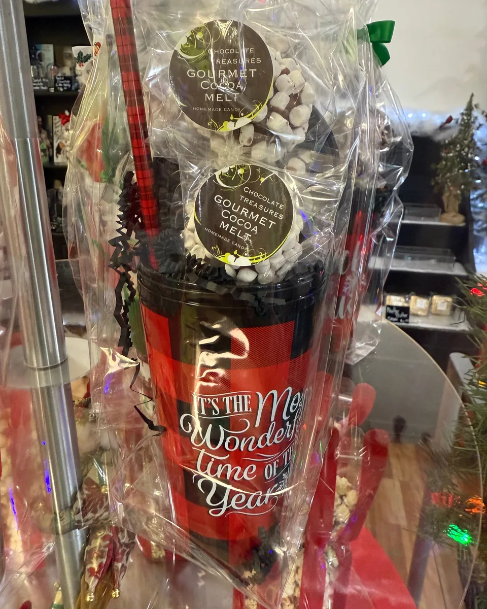 A packaged holiday gift set with two Chocolate Treasures gourmet cocoa melts