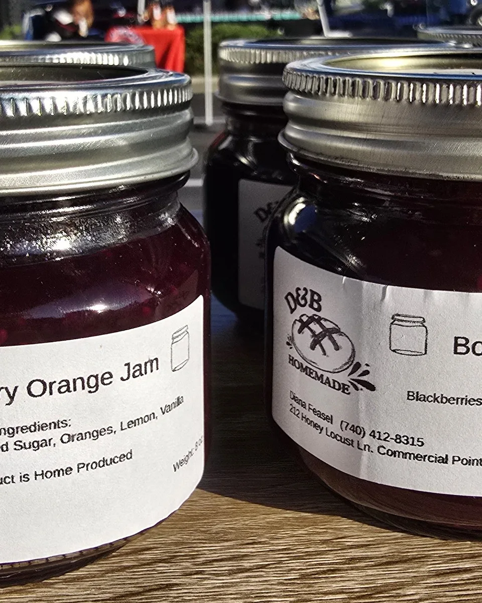Jars of blackberry orange and bourbon blackberry jam