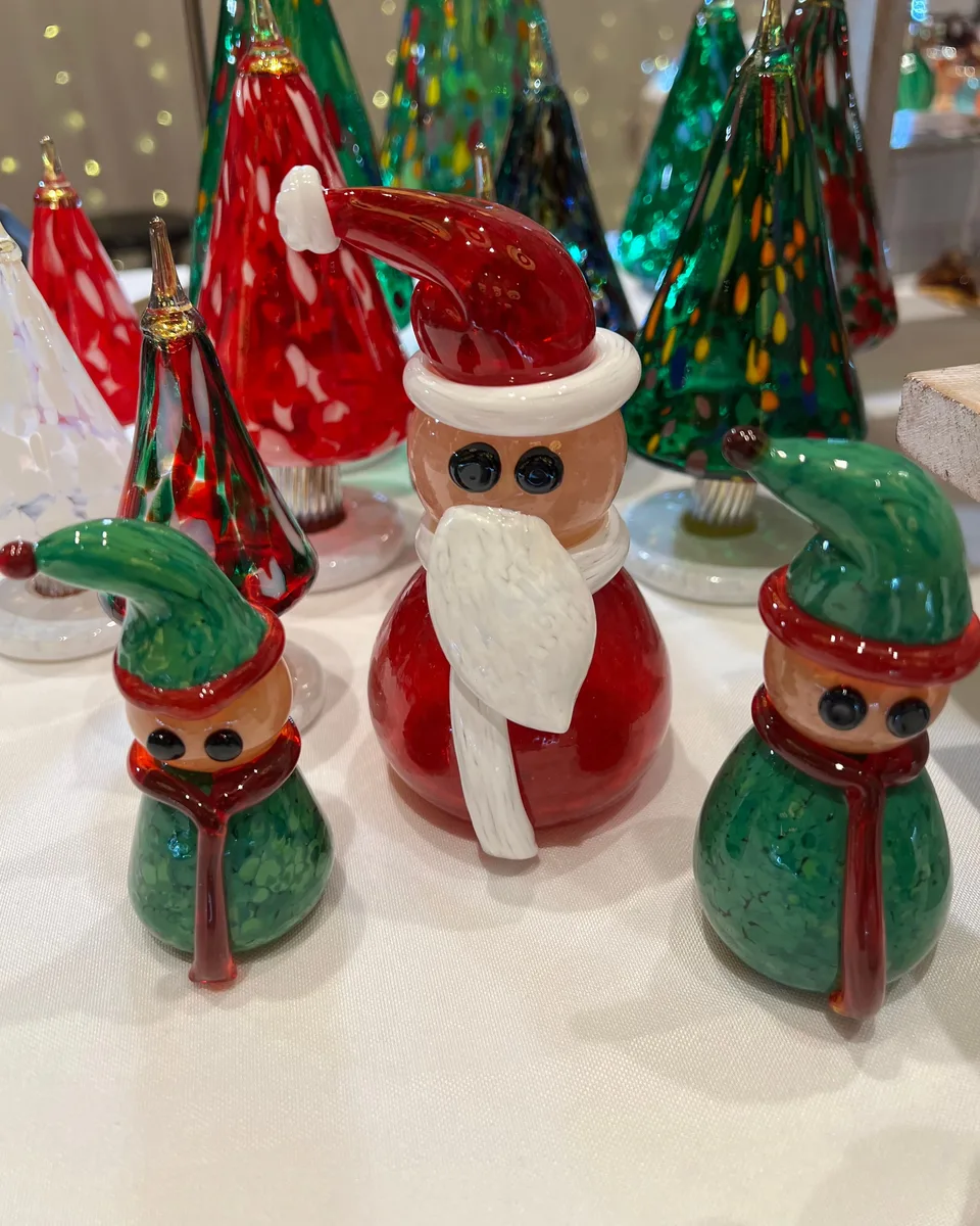 Hand-blown glass Santa, elves and colorful holiday trees